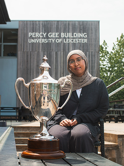 Frank May Cup and Aleemah in front of the Percy Gee Building University of Leicester